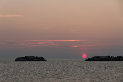 Scenic view of sea at sunset