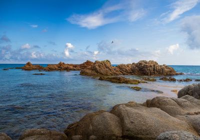 Beach landscape with rocks background, typical mediterranean beach - 