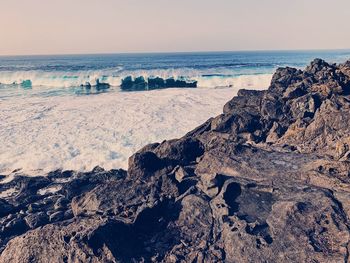 Scenic view of sea against clear sky