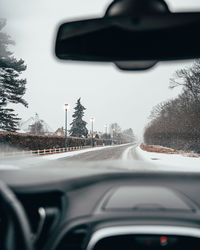Road seen through car windshield