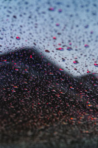 Full frame shot of wet car windshield