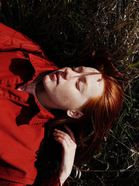 Portrait of young woman lying down