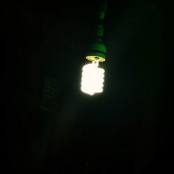 Low angle view of illuminated lamp post