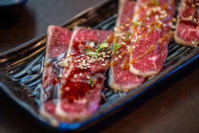 Close-up of meat on table