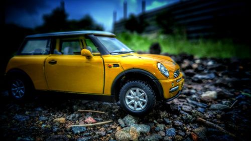 Close-up of yellow car