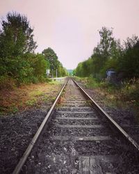 Railroad track against sky