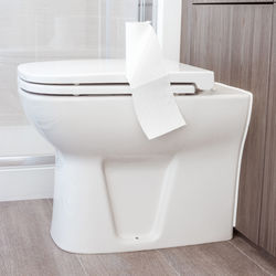 Close-up of white bathroom on table at home