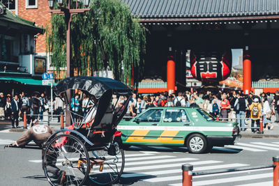 People on street in city