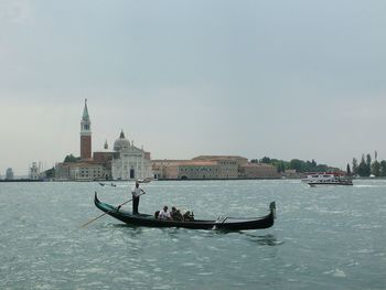 Boats sailing in canal