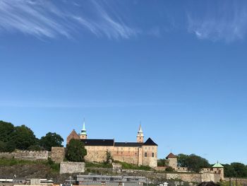 Buildings against blue sky