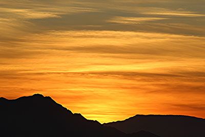 Scenic view of dramatic sky during sunset