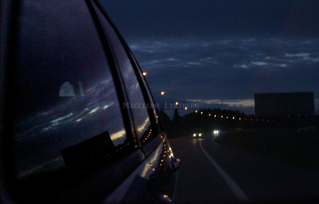 transportation, illuminated, sky, architecture, built structure, night, road, building exterior, cloud - sky, city, car, dusk, mode of transport, no people, land vehicle, street, cloud, long exposure, cloudy, outdoors