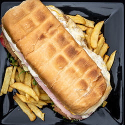 High angle view of meat on barbecue grill