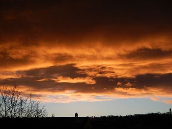 Low angle view of dramatic sky at sunset