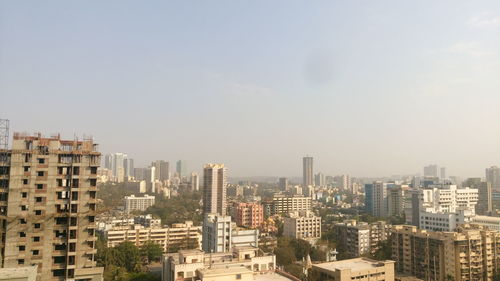 Cityscape against clear sky