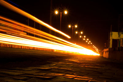 Light trails on street at night