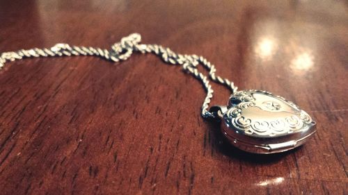 Close-up of necklace on table