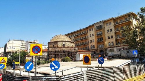 View of buildings against blue sky