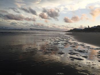 Scenic view of beach against sky