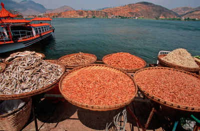 High angle view of spices in sea against mountains