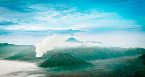 Scenic view of volcanic landscape against sky