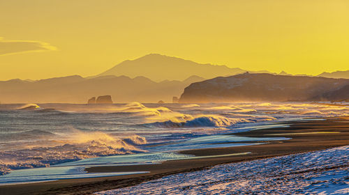 Colorful sunrise in the pacific ocean in kamchatka peninsula