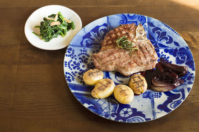 High angle view of food served on table