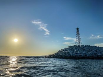 View of sea against cloudy sky