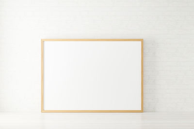 Low angle view of empty paper against white background