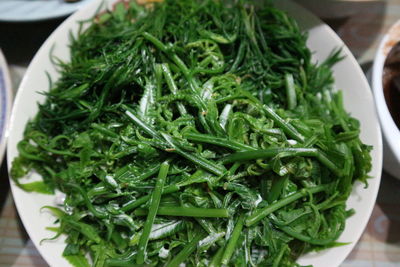 High angle view of chopped vegetables in plate