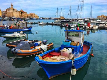 Boats moored in harbor