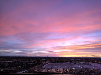 Aerial view of cityscape at sunset