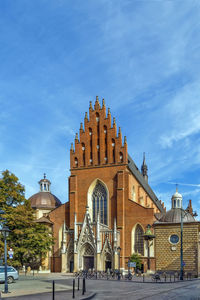 Facade of historic building against sky