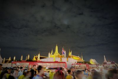 Group of people in front of crowd