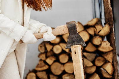 Rear view of woman working in workshop