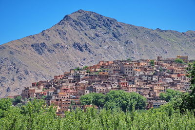 Panoramic shot of townscape against mountains