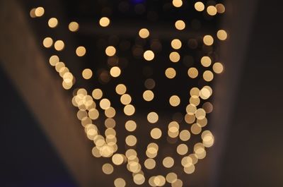 Close-up of illuminated light bulb