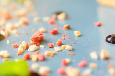 Close-up of multi colored candies on table