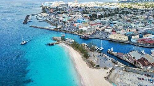 High angle view of boats moored at harbor