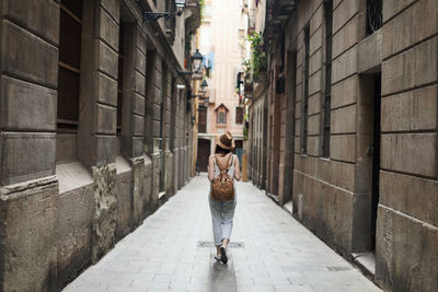 Young tourist discovering streets of barcelona