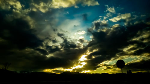 Low angle view of dramatic sky during sunset