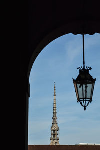 Low angle view of illuminated building against sky