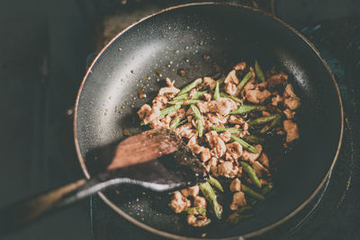 High angle view of meat in cooking pan