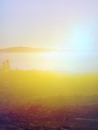 Scenic view of landscape against sky during sunset