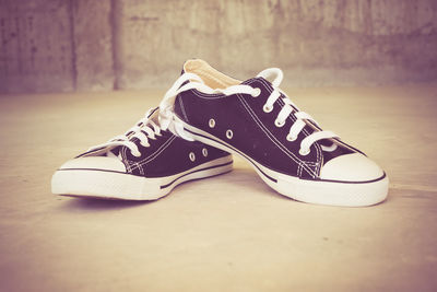 Close-up of shoes on floor