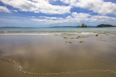 Scenic view of beach against sky