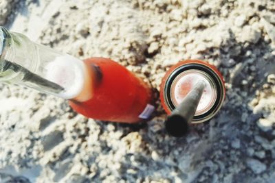 High angle view of drink on rock