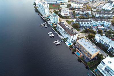 High angle view of river amidst buildings in city