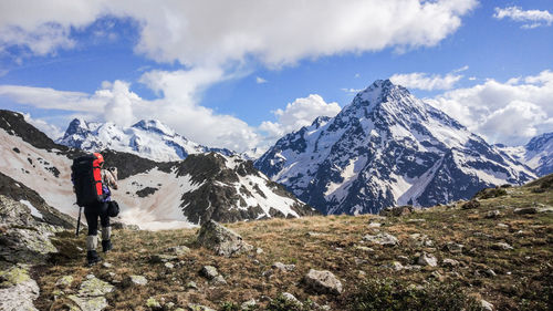 Scenic view of snowcapped mountains against sky