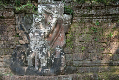 Close-up of statue against trees